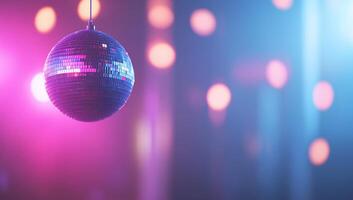 A disco ball hanging from a string photo