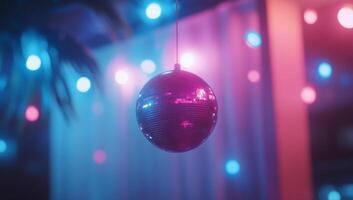 A disco ball hanging from a string photo