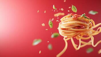 A vibrant image of pasta with sauce and herbs against a red background. photo