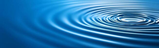 A close-up view of rippling water in a serene blue environment. photo