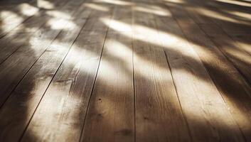 Close-up of wooden floor with natural light and shadows. photo