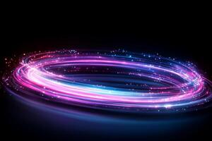 A vibrant swirl of light in pink and blue, creating a dynamic effect. photo
