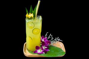 Fresh drink with Kumquat and citrus juice isolated on black background photo