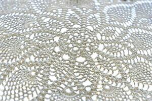 knots of macrame technique made of white threads photo