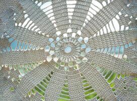 Various knot of macrame technique made of white threads photo