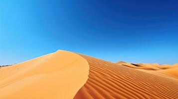 A desert landscape with sand dunes and blue sky photo