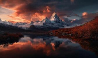 A beautiful mountain scene with a lake and clouds photo