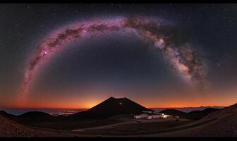 Milky Way arc over volcanic observatory photo