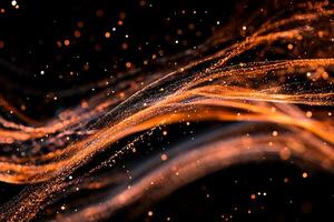 Abstract fiery, flowing particles. Dynamic streaks of orange-gold particles against a black backdrop with glowing specks photo