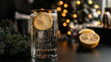Refreshing, fizzy drink with lemon slice photo