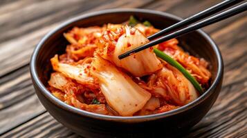 Fermented cabbage dish, flavorful and spicy. Chopped cabbage marinated in a spicy sauce. Appetizing, ready-to-eat Korean side dish photo