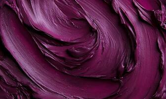 A close up of a purple paint swirl photo