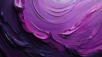 Abstract swirls of vibrant purple and violet paint photo