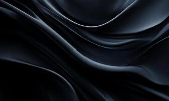 Dark, flowing fabric with elegant, smooth curves photo