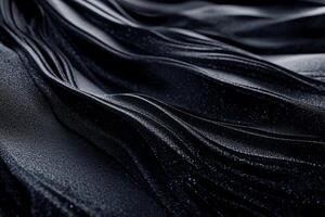 Abstract dark fabric folds. Flowing, sculpted, textured photo