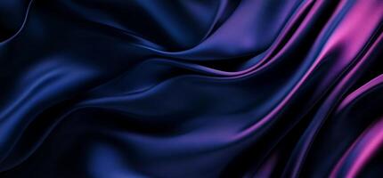 Dark, flowing fabric with purple hues photo