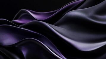 Dark purple fabric flowing elegantly, showing rich texture and subtle gradient photo