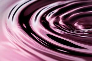 A swirl of liquid in a purple background photo