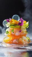 Scallop tartare tower with yuzu dressing and edible flowers showcased on a high-gloss plate amidst a cool mist photo