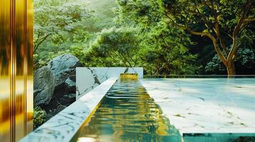 Tranquil outdoor infinity pool with lush greenery and rock formations in the background, offering a serene and refreshing escape in nature. photo