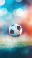 Soccer ball hovering over field in blurred stadium background photo
