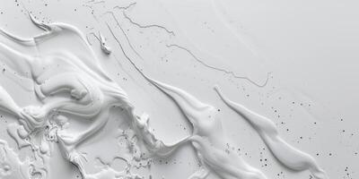 White liquid flowing over a surface photo