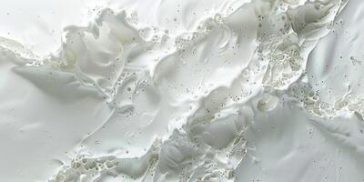 A white substance is being sprayed on a surface photo