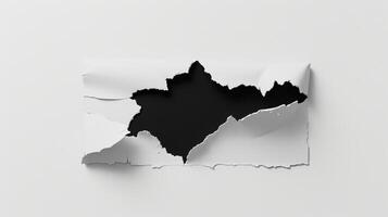 A black and white torn paper with a hole in it photo