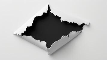 A hole in a white paper with a black hole photo