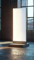 Blank billboard stand in an empty room photo