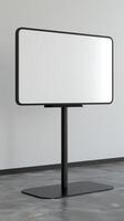 A white board on a stand in a room photo