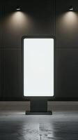A blank billboard in a dark room with lights photo