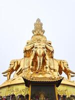 golden buddha statue at the temple of the golden buddha in taiwan photo