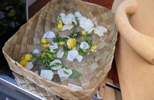a basket with flowers in it photo