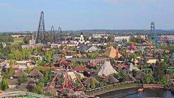 Aerial view of Energylandia amusement park in Poland, thrilling roller coasters and themed attractions, vibrant entertainment destination for family fun video