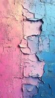 Colorful cracked wall with gradients of pink and blue showcasing an urban, textured atmosphere in late afternoon light photo