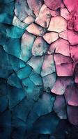 Abstract textured surface featuring a mix of blue and pink shades with cracked patterns and striking visual contrast photo