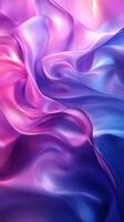 Soft waves of colorful silk create a mesmerizing pattern in shades of pink and blue during the evening light photo