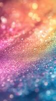 Vibrant glitter texture in shades of pink, orange, blue, and gold creates a stunning visual effect for artistic inspiration photo