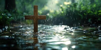 Rain falls gently on a wooden cross amidst a peaceful forest stream in a tranquil setting photo
