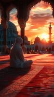 Spiritual reflection at sunset near a mosque with intricate architecture and vibrant sky hues photo