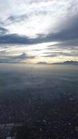 The view from an airplane as it flies over a city video