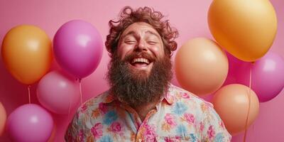 Joyful man with a beard smiling amidst colorful balloons at a vibrant celebration photo