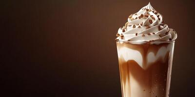 Delicious chocolate milkshake topped with whipped cream and chocolate sprinkles in a glass photo
