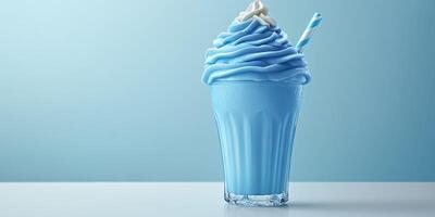 Delicious blue frozen dessert served in a clear glass on a light blue background with a striped straw photo