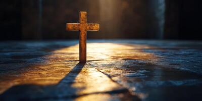 Light illuminates a solitary cross in a dimly lit space highlighting themes of faith and spirituality photo