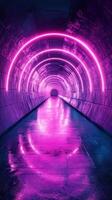 Vibrant neon tunnel illuminated by pink lights reflects on wet ground in a modern urban setting at night photo