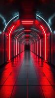 Vivid red neon lights illuminate an underground tunnel with reflective floors at night photo