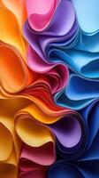 Colorful waves of paper create an abstract pattern in a vibrant display of hues and textures photo