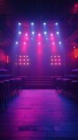 Colorful stage lights illuminate an empty performance space in a nightclub setting during evening hours photo
